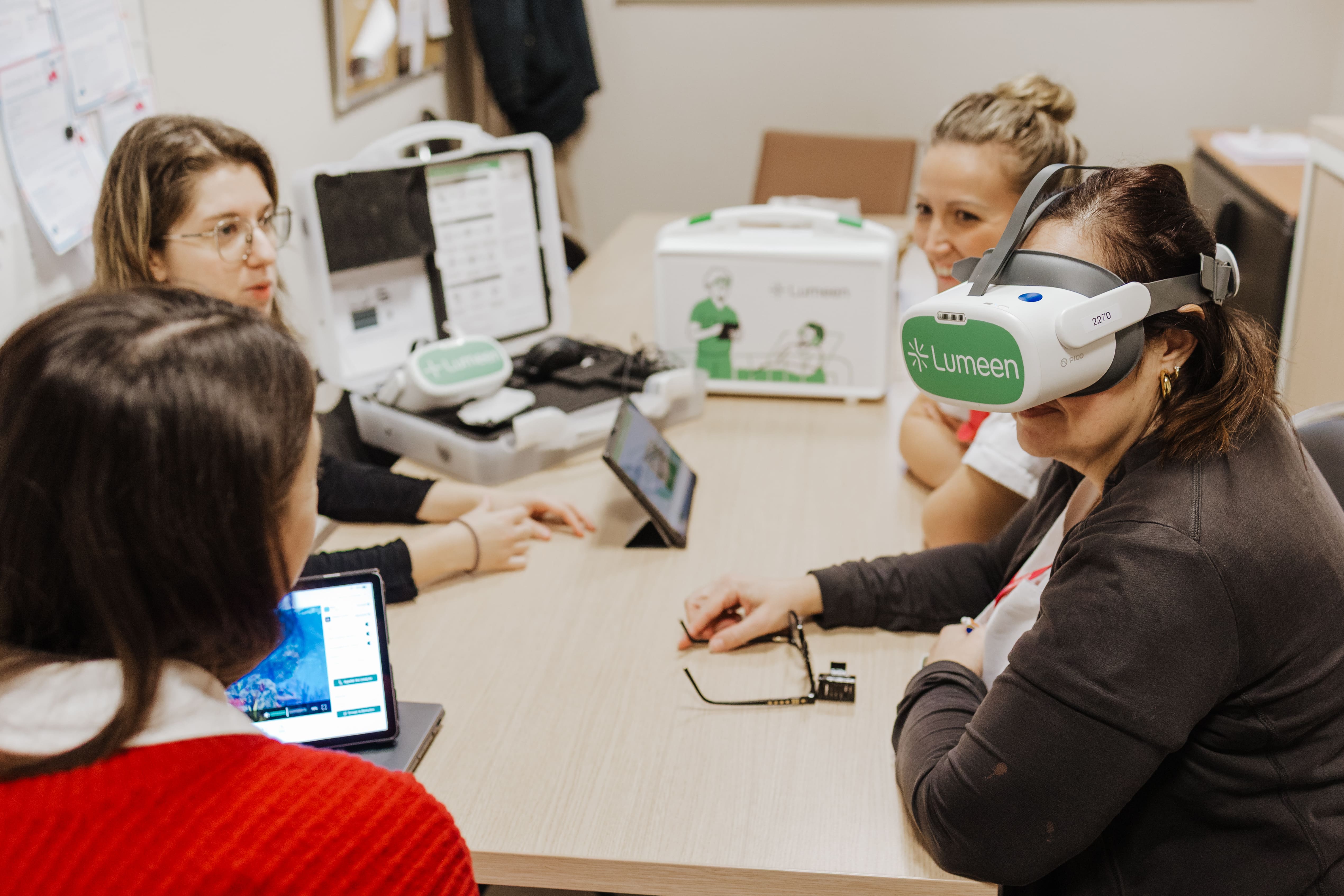 a group of people testing a virtual reality headset